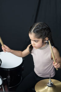 Young woman playing guitar