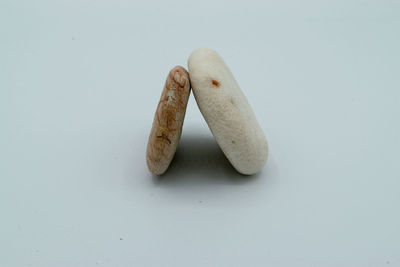 High angle view of bread on white background