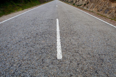 High angle view of arrow sign on road