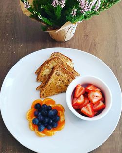 High angle view of breakfast served on table