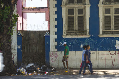 People standing outside building