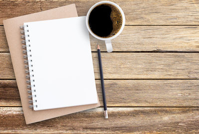 High angle view of coffee cup on table