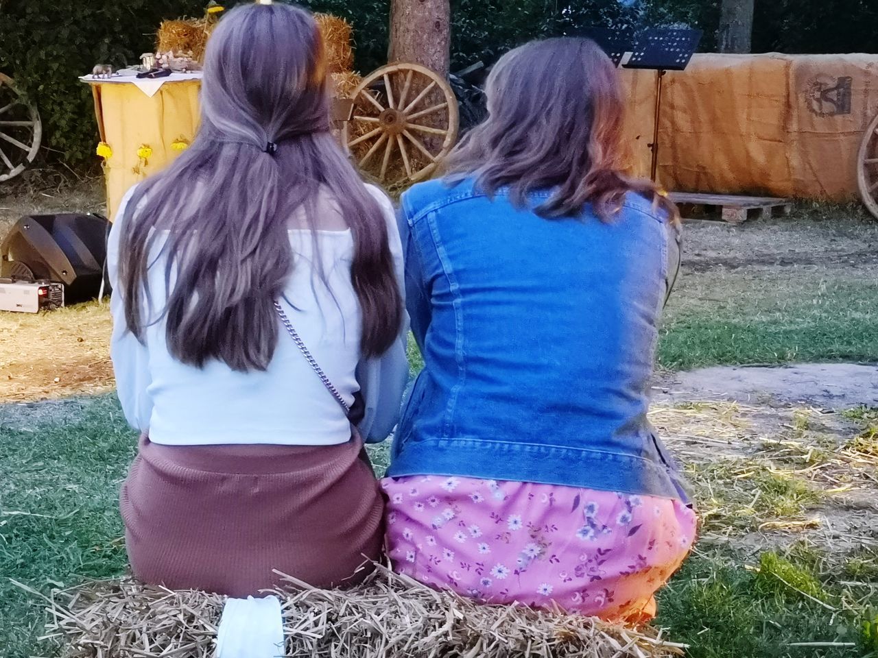 REAR VIEW OF WOMEN IN TRADITIONAL CLOTHING OUTDOORS