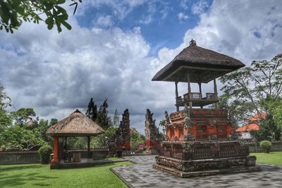 Gazebo by building against sky