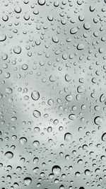 Close-up of water drops on glass
