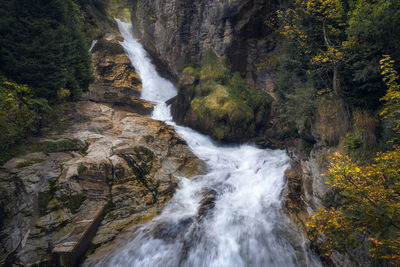 Autumn colors, cascading waterfall, bad gastein near salzburg austria