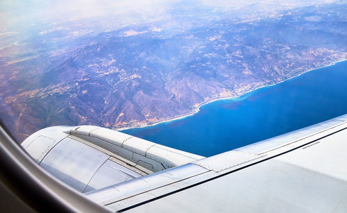 Aerial view of mountains against sky