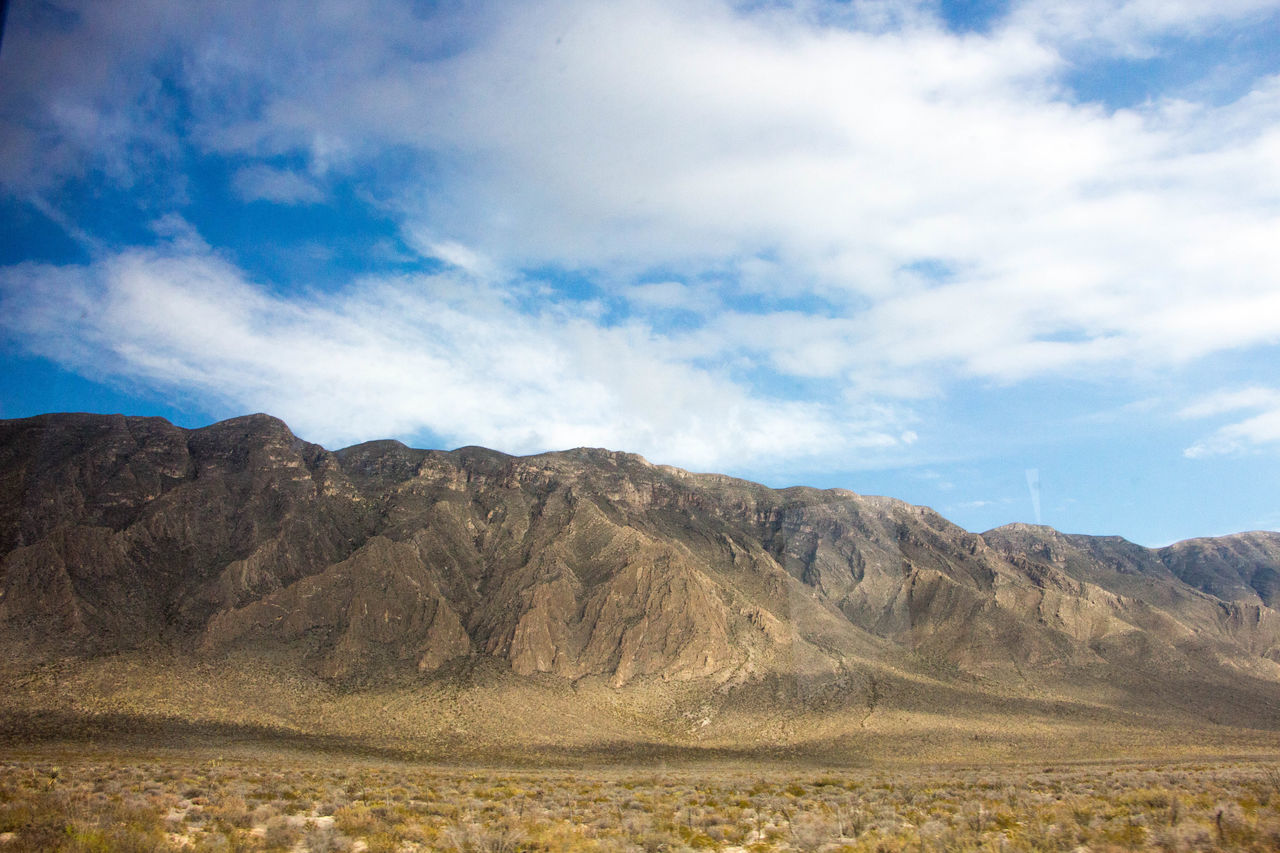 sky, nature, cloud - sky, no people, scenics, day, beauty in nature, landscape, outdoors, mountain, sand dune