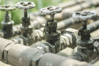 Close-up of valves on pipes