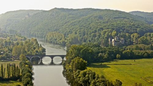 Scenic view of river and mountains
