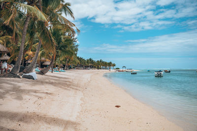 Scenic view of beach against sky