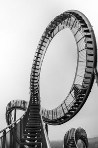 Low angle view of spiral staircase against clear sky