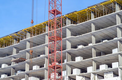 Construction of multi-storey building. crane.