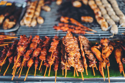 Close-up of meat on barbecue grill