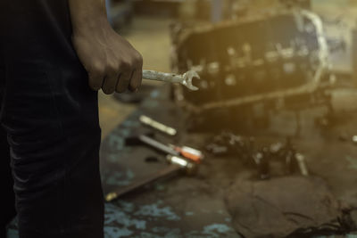 Midsection of man working