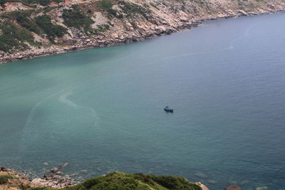 High angle view of sea and mountains