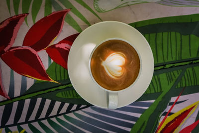 Close-up of coffee cup on table