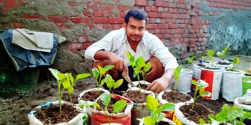 Young man preparing food outdoors