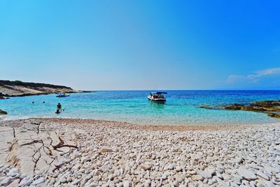 Scenic view of sea against clear sky