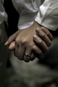 Close-up of couple hands