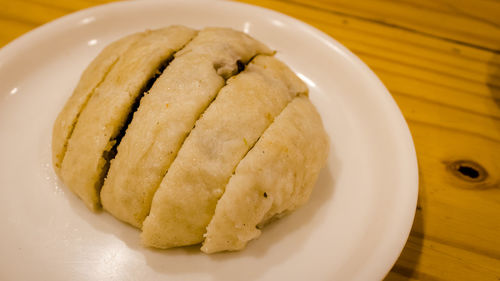 High angle view of bread in plate on table