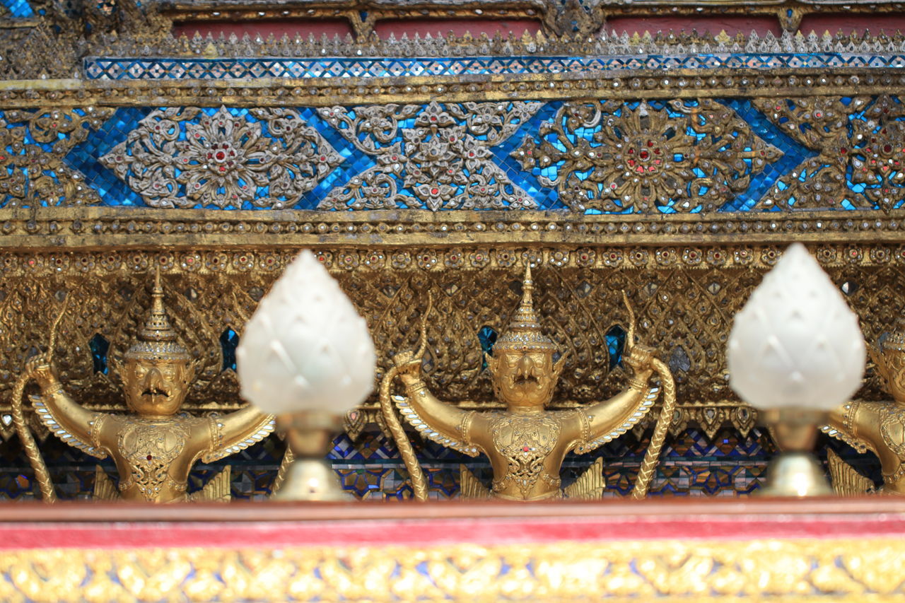 CLOSE-UP OF BUDDHA STATUE