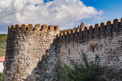 Walls of mtskheta and jvari monastery at background