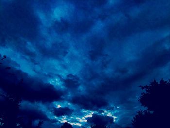 Low angle view of clouds in sky at dusk