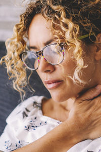 Portrait of young woman wearing sunglasses