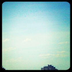 Low angle view of built structure against blue sky