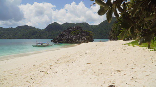 Scenic view of beach against sky