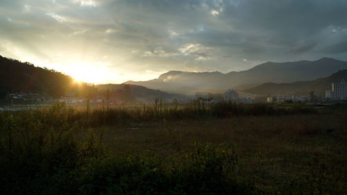 Scenic view of landscape against sky during sunset