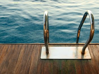 High angle view of wooden pier over sea