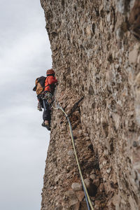 Low angle view of climber on montserrat mountain, in barcelona 


