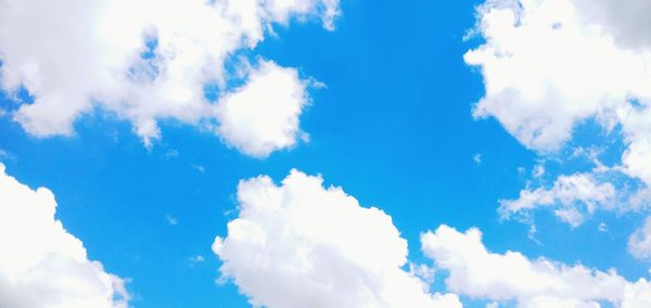 Low angle view of clouds in blue sky