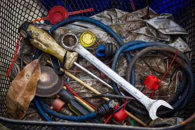 High angle view of messy work tools in workshop