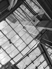Low angle view of glass ceiling in building