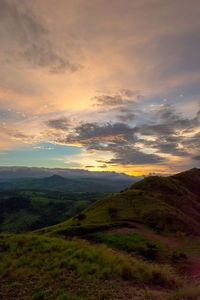 Scenic view of landscape against sky during sunset