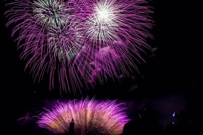 Low angle view of firework display