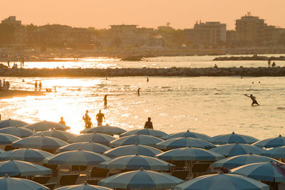 View of beach against sky during sunset