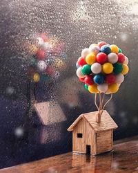 Close-up of multi colored balloons on table