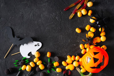 High angle view of multi colored candies in container