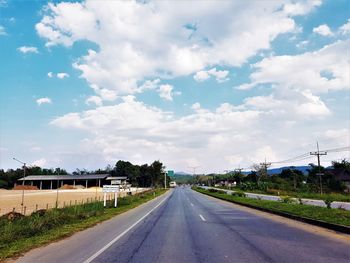 Empty road against sky