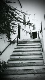 Low angle view of stairs against built structure