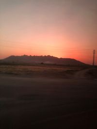 Scenic view of landscape against sky during sunset