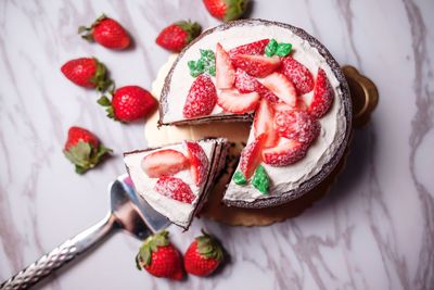 High angle view of cake on marble