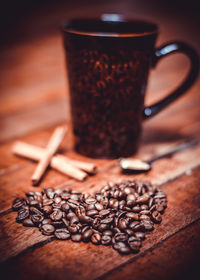 Close-up of coffee beans on table