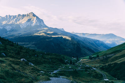 Scenic view of snowcapped mountains against sky