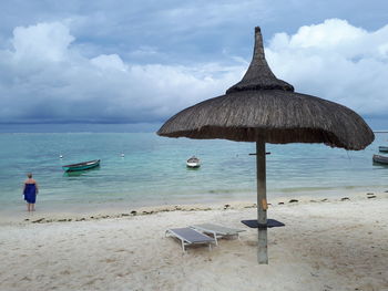 Scenic view of beach against sky