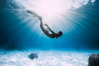 Man swimming in sea